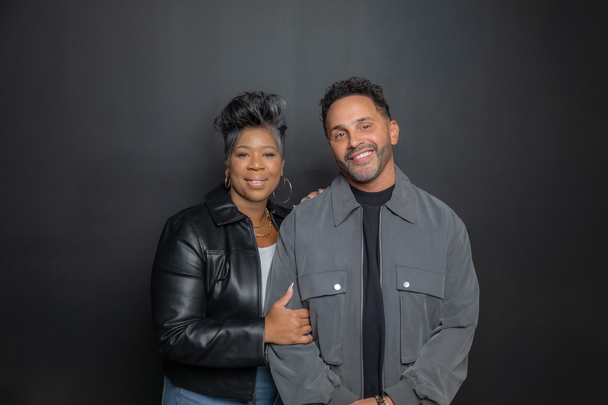 Pastor Tony and Pastor Faythe standing together and smiling